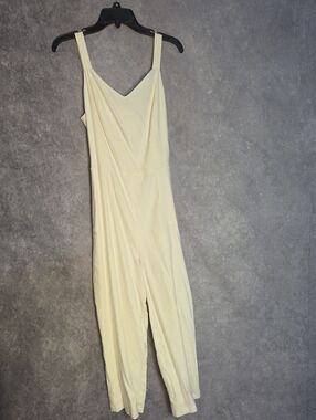 Limited Sleeveless White Jumpsuit with V-Neck And Belt Tie